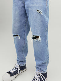 Pantalone Jeans Con Strappo